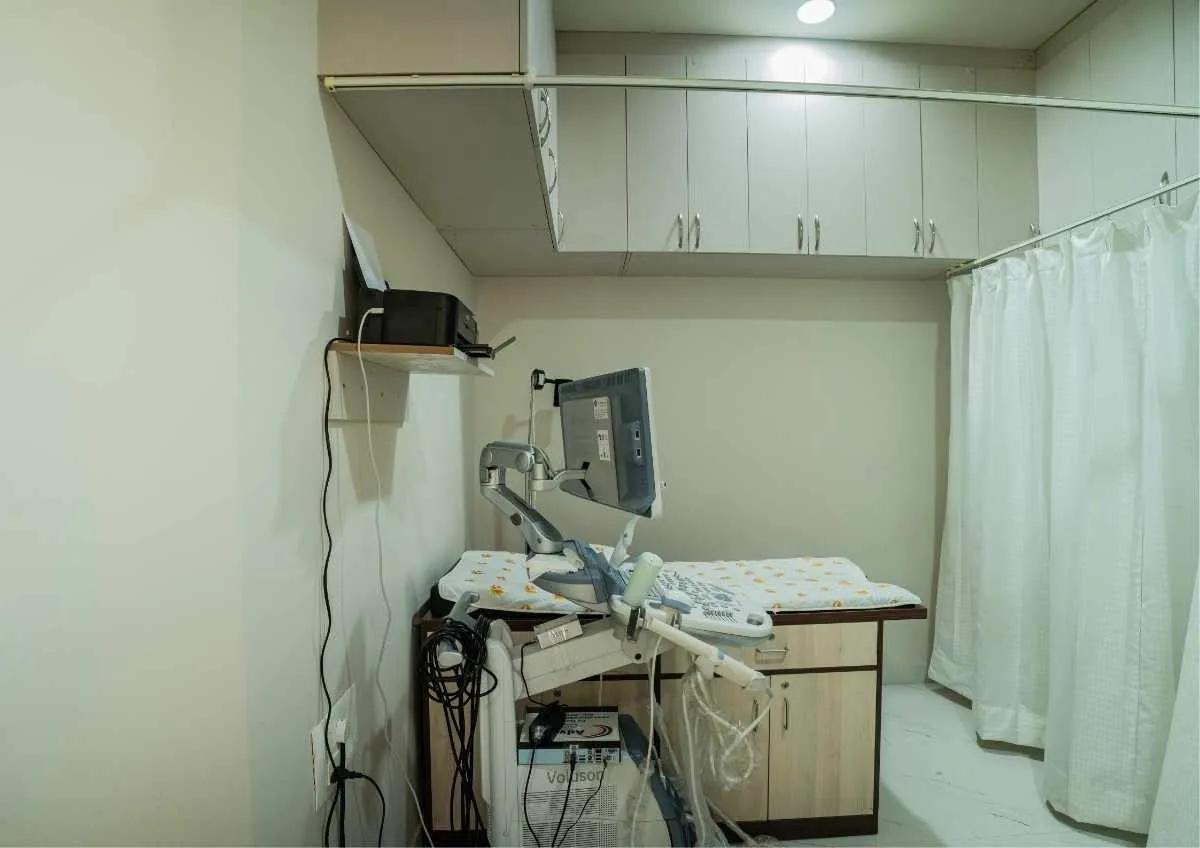 Lab technician working with equipment